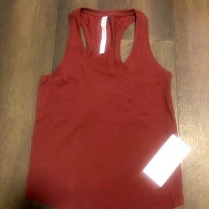 Lululemon rust colored tank, new w tags, sz 4